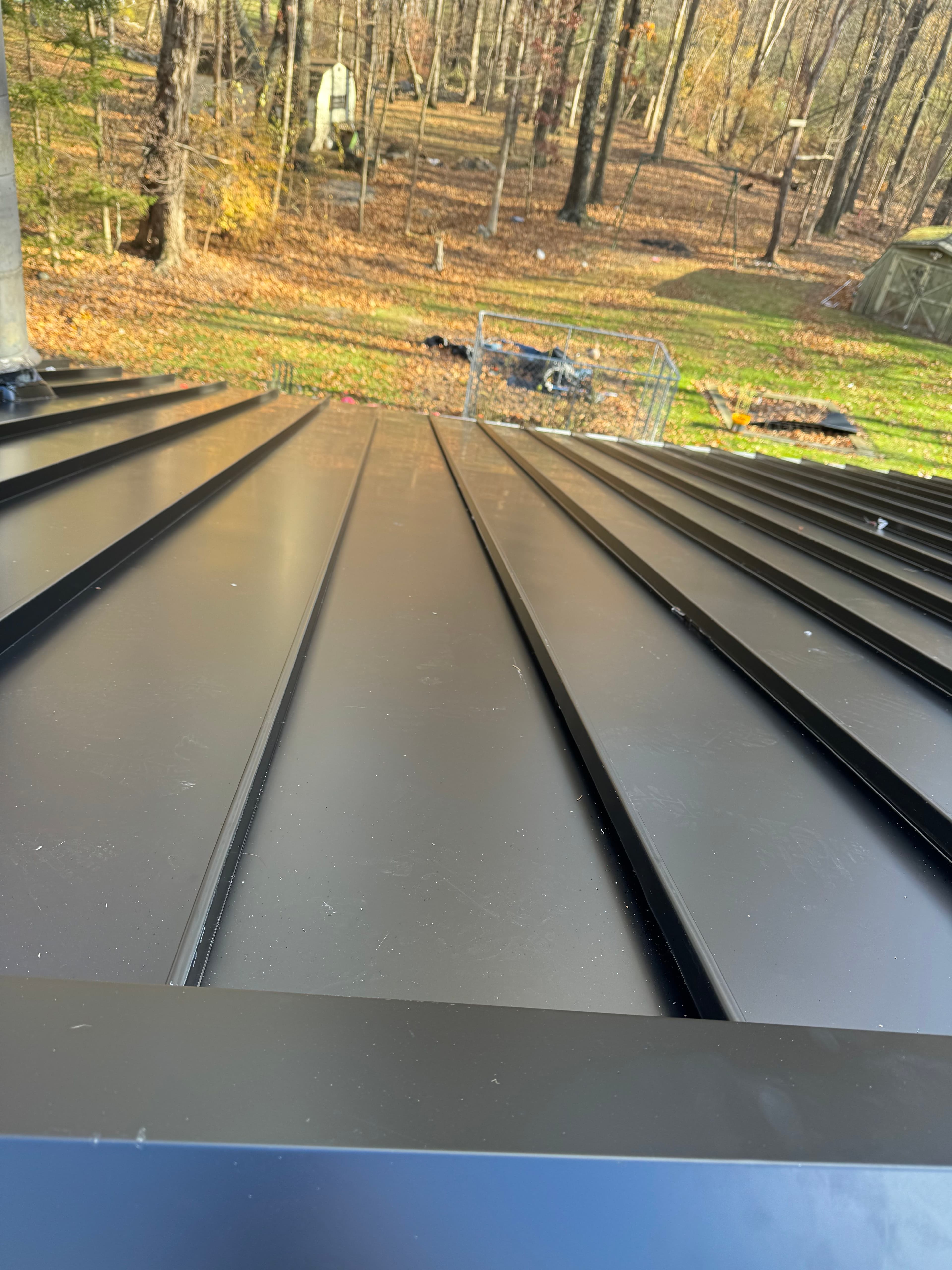 Project Standing Seam Metal Roof Installation and Full Framing Restoration in Upper Saddle River NJ image